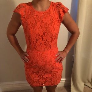 Open back Orange Lace dress. NWT. Sz Medium